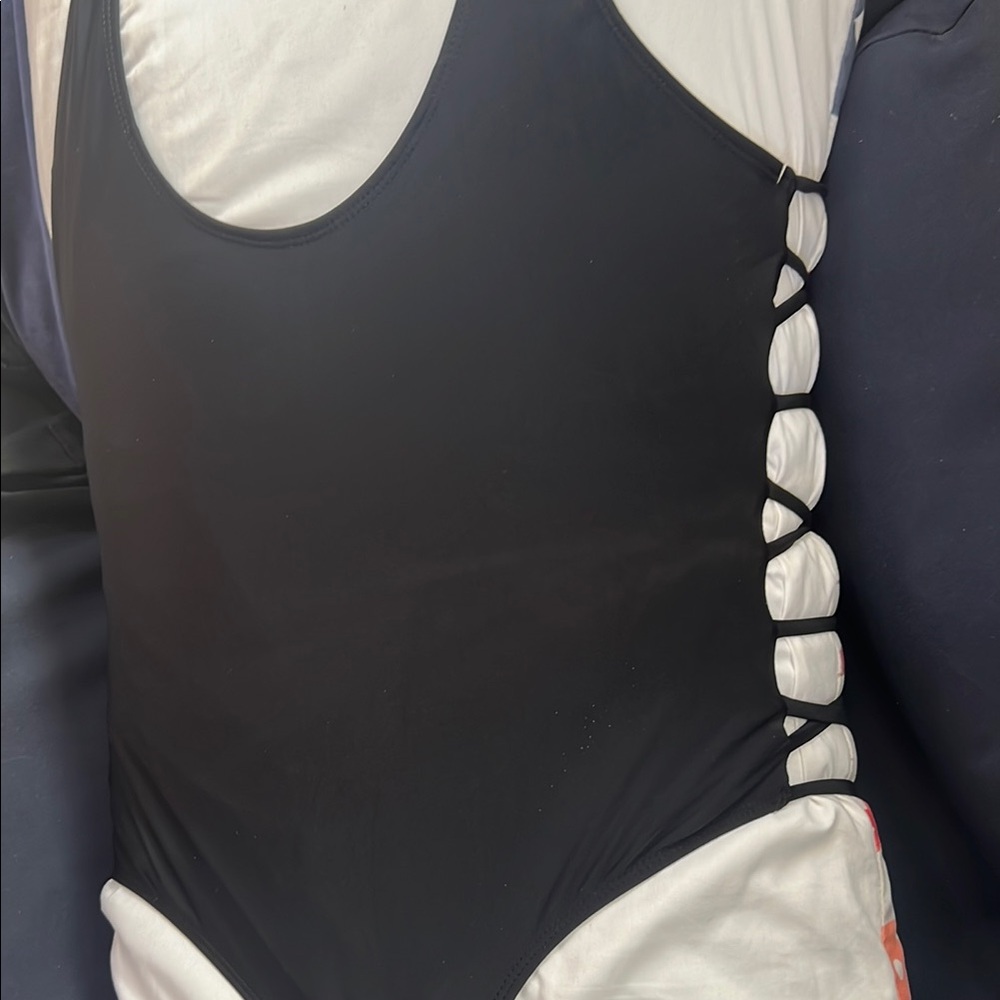 Women Black and White One Piece pre own.